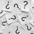 Background texture of printed question marks Background texture of printed question marks